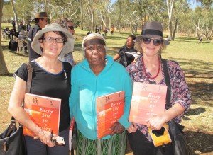 Marg Bowman, Violet Petyarre, Jenny Green holding book