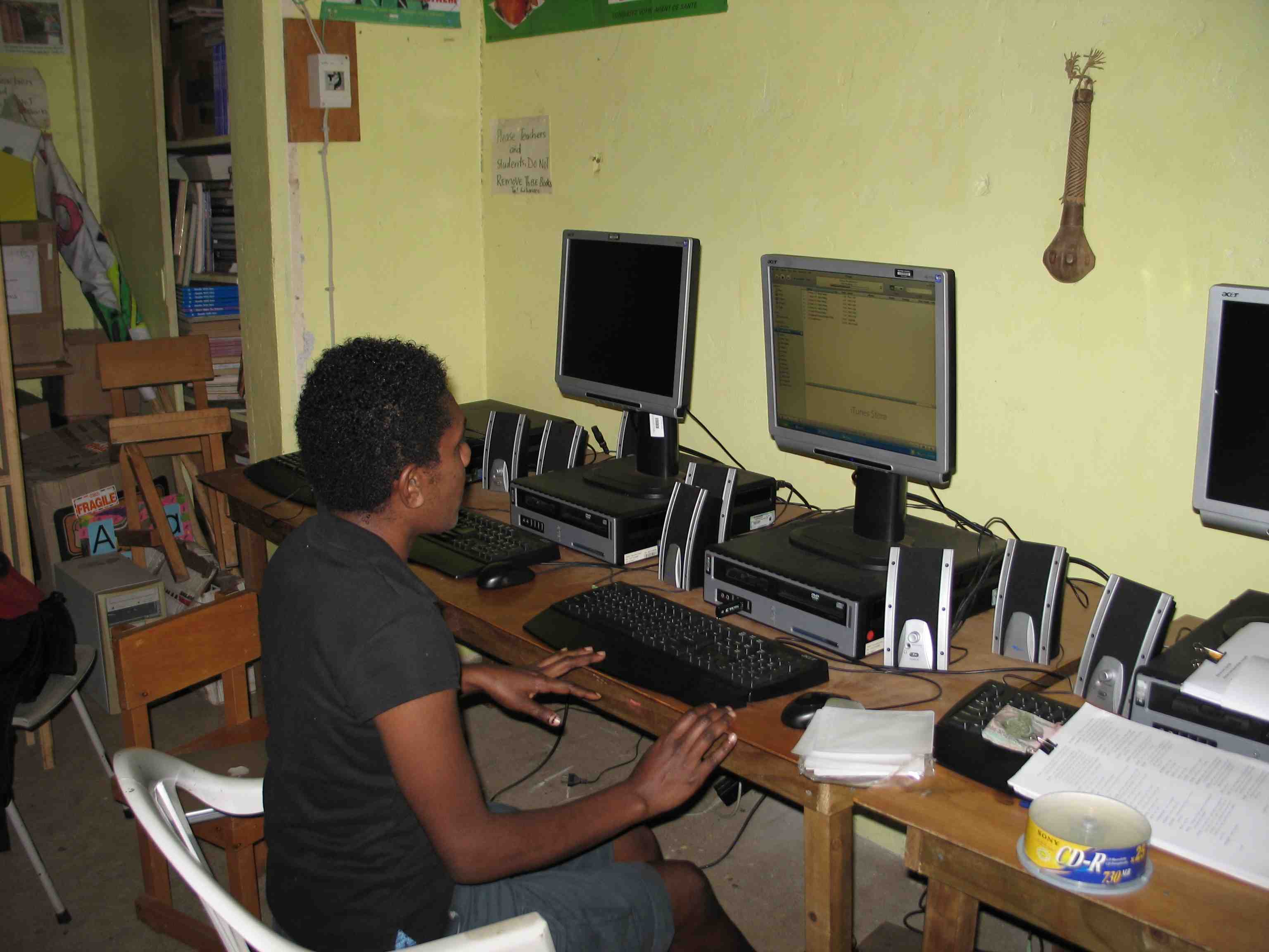 Endis Kalsarap constructing a playlist on the school computer